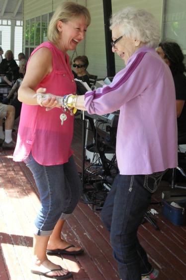 Volunteers_of_America_Elder_Homestead_Staff_memember_dancing_with_a_senior_citizen_resident.jpg